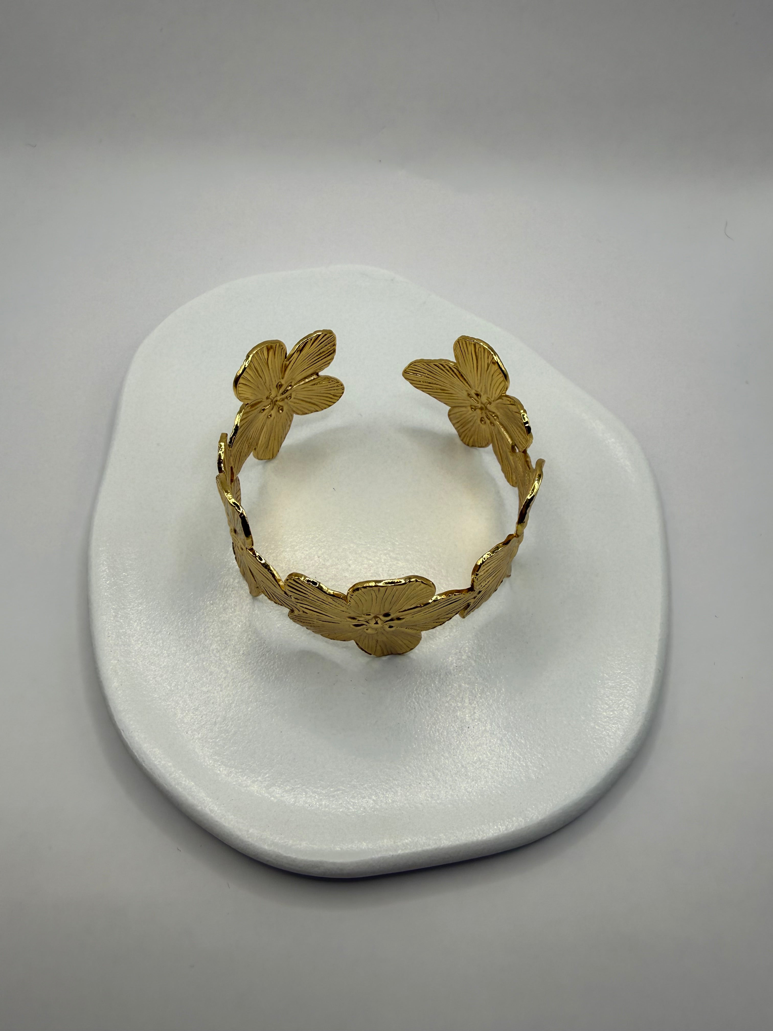 Lot de boucles d’oreilles + bracelet