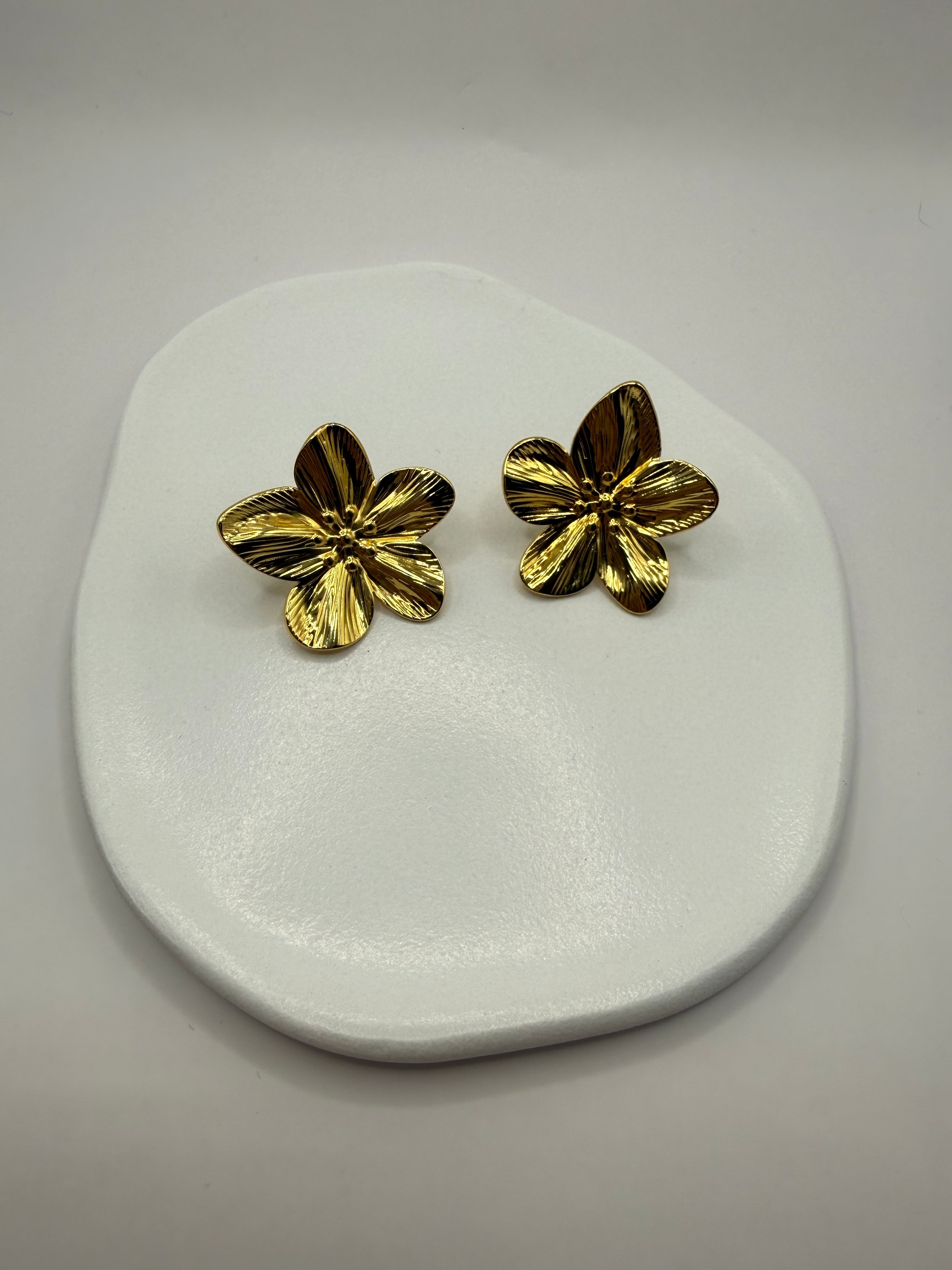 Lot de boucles d’oreilles + bracelet